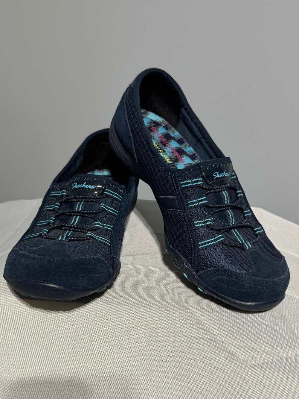 Skechers Relaxed Fit Memory Foam Navy Slip-On Sneakers with Teal Stitching